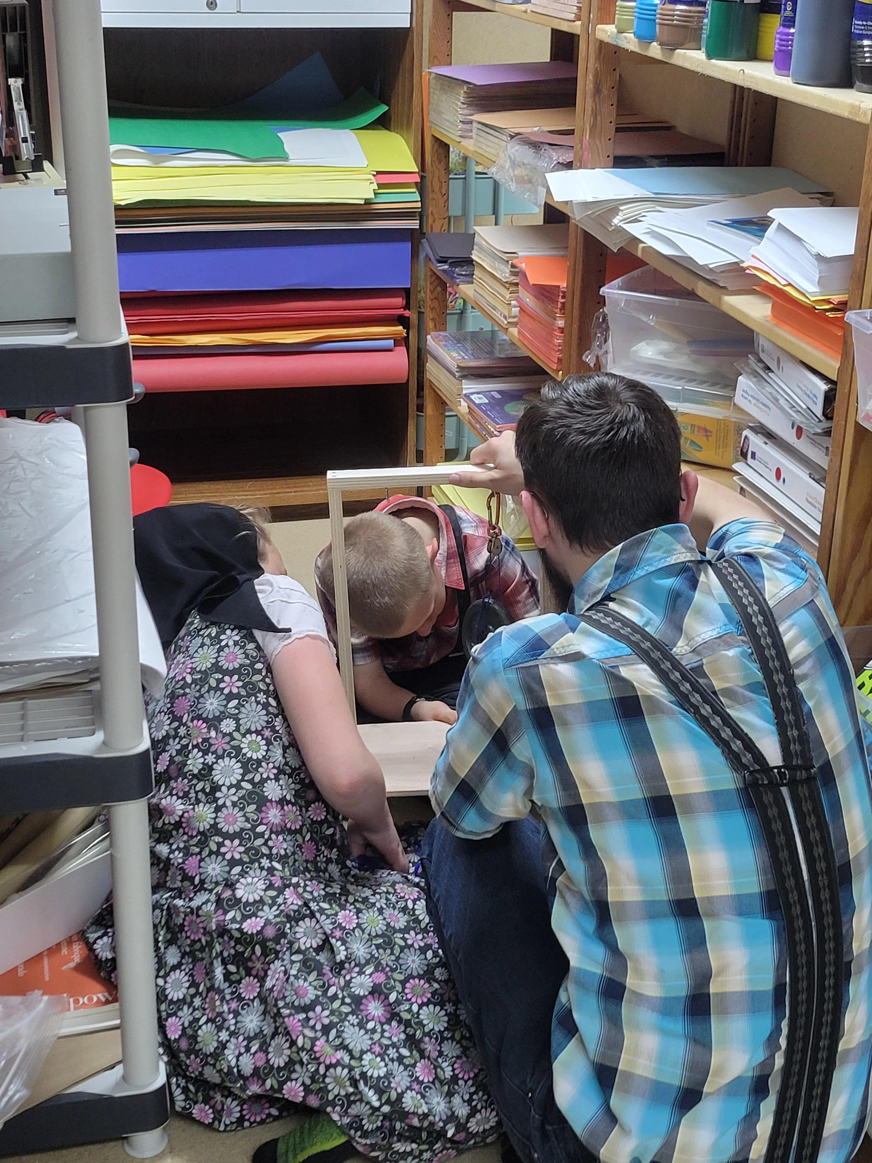 Students working on a pulley-system activity